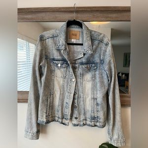 PAIGE distressed light denim jacket.